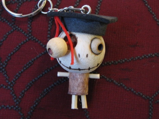 Eye Popping Out Graduate Hat Woody Keychain - Click Image to Close