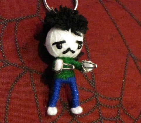 Mohawk Gunman Voodoo Keychain - Click Image to Close