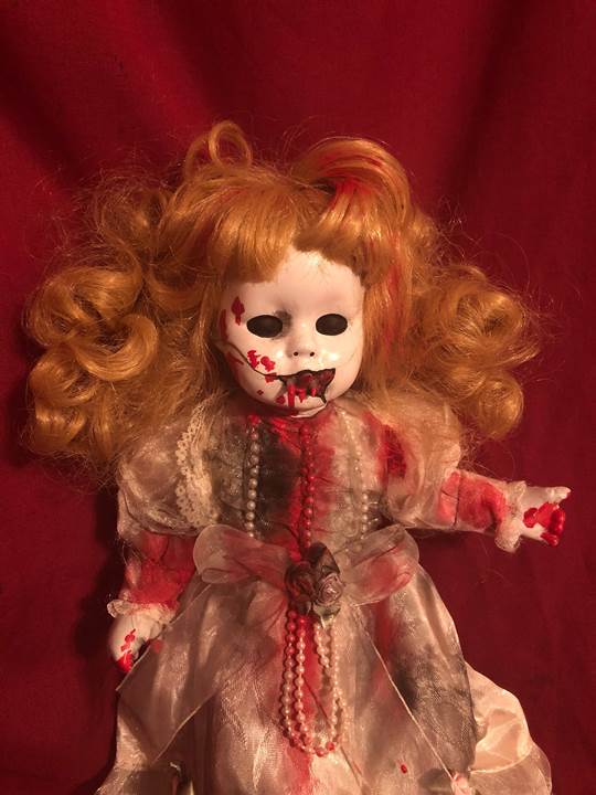 creepy vampire doll