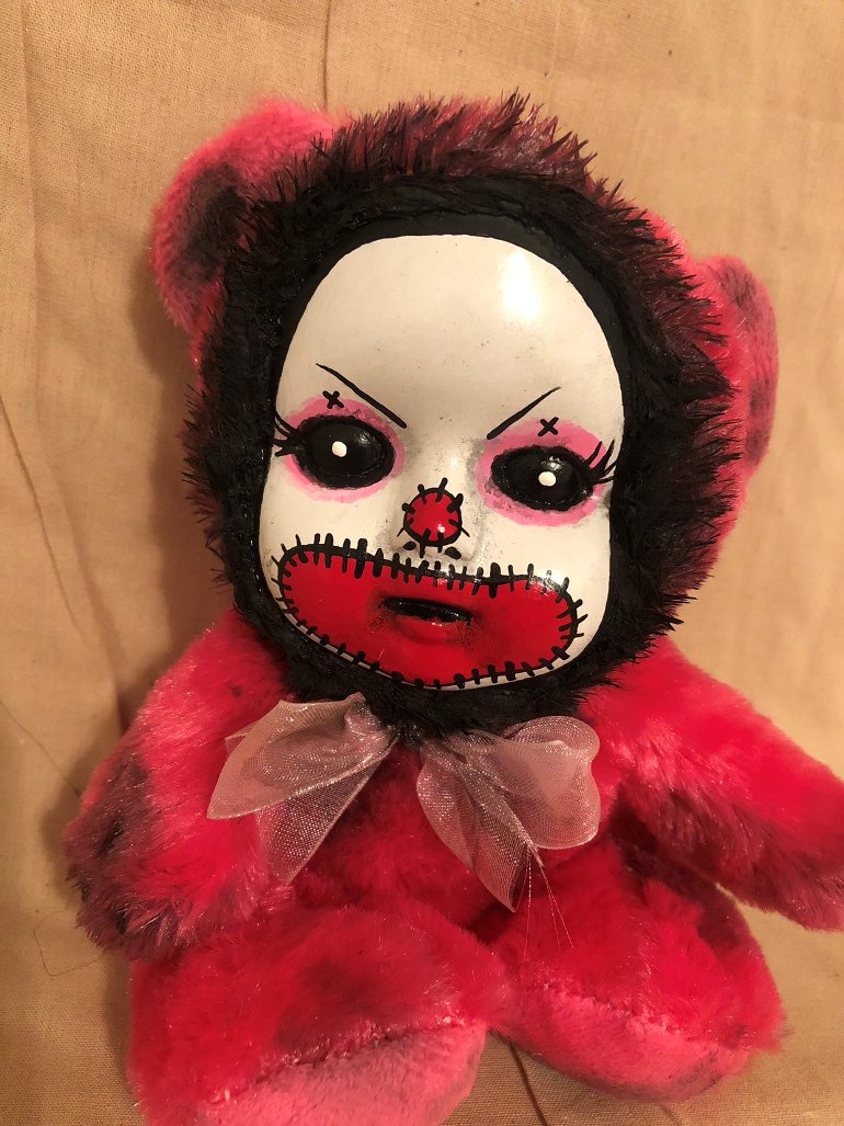 creepy bear doll