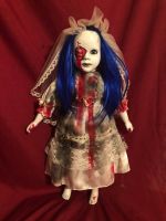 creepy vampire doll